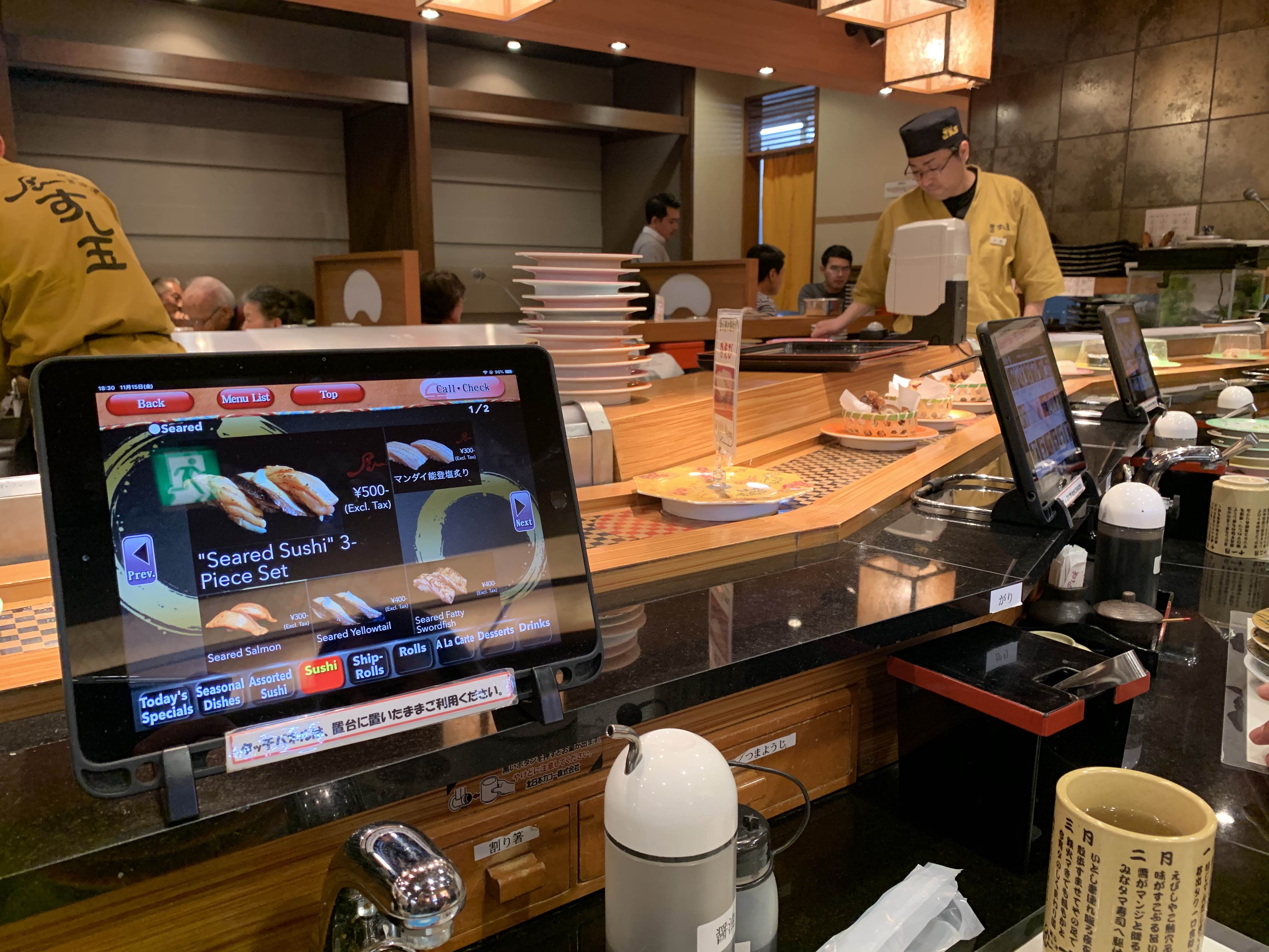 photo of sushi conveyor belt